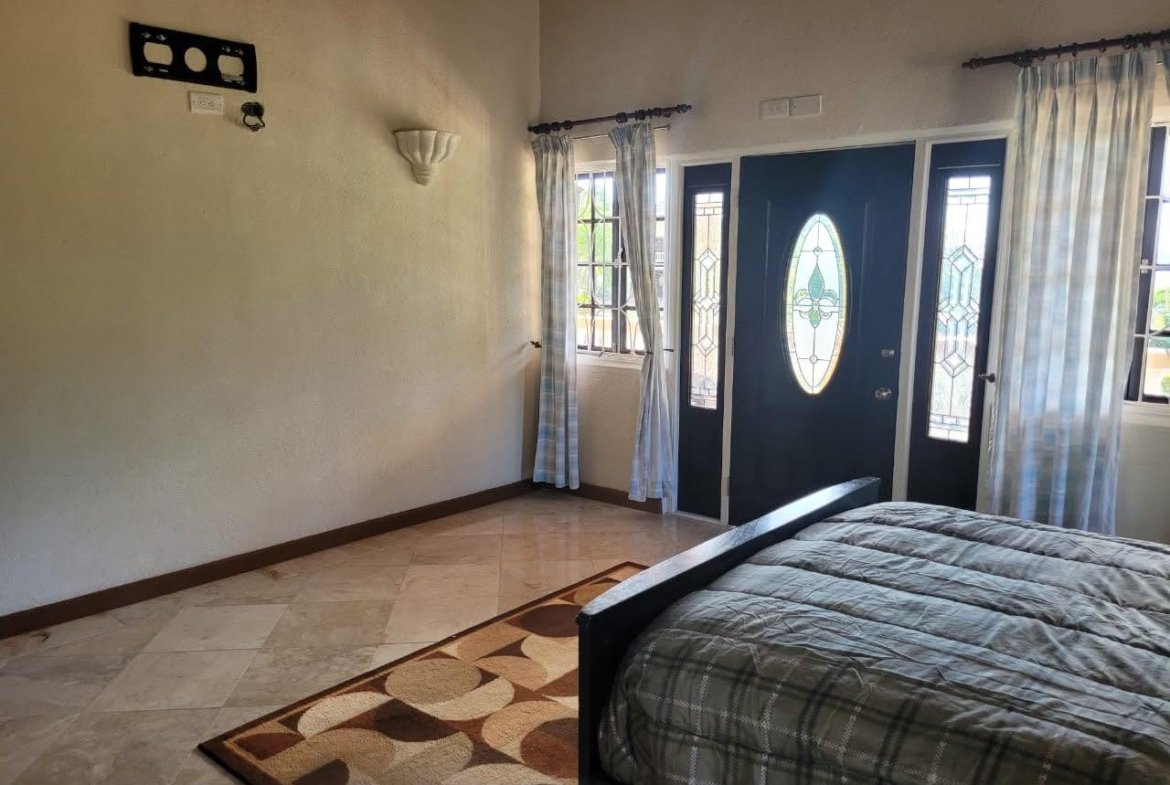 Bedroom of Home For Sale In Marigot Bay 2
