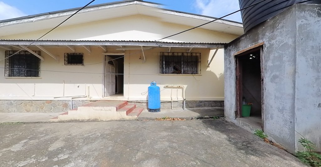 Backside of Fixer Upper Home for Sale in New Extension, Micoud.jpg screenshot 2024-02-09 13-00-17