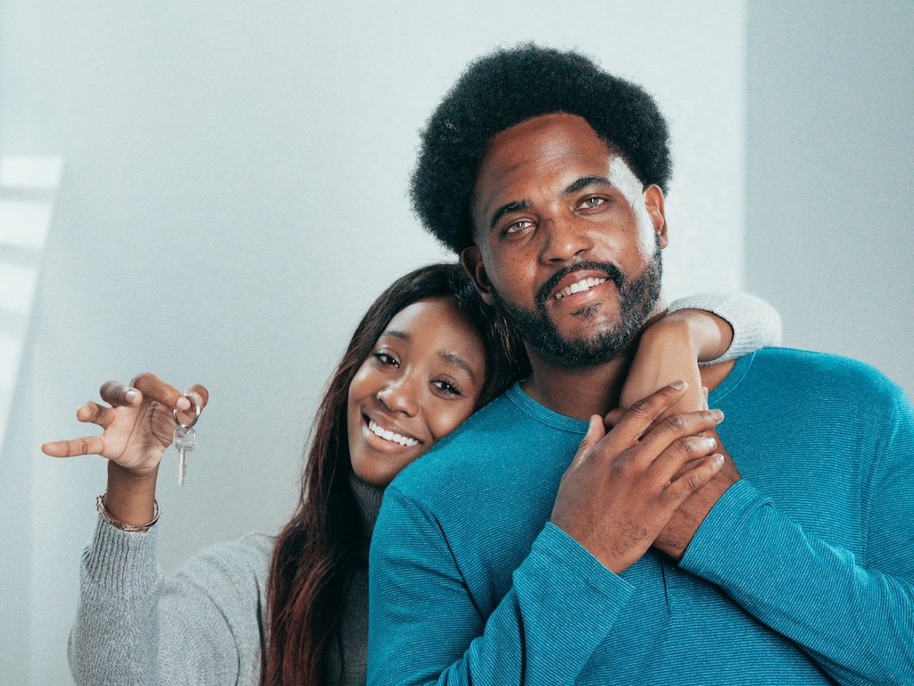 Couple with Keys to Home